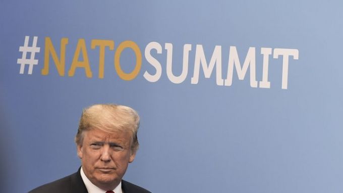 Доналд Тръмп пристига за втория ден от разговори на срещата на върха на НАТО в Брюксел.