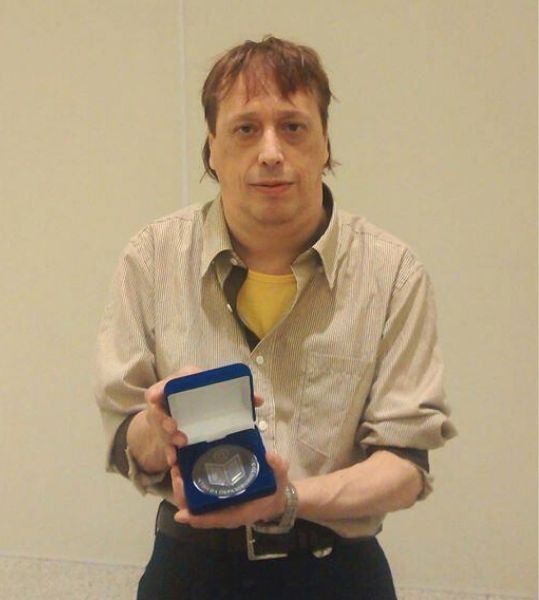 Mikhail Krastanov with medal from Ministry of Education, for contribution og Bulgarian School in Sao Paulo for promoting Bulgarian language, folklore and traditions