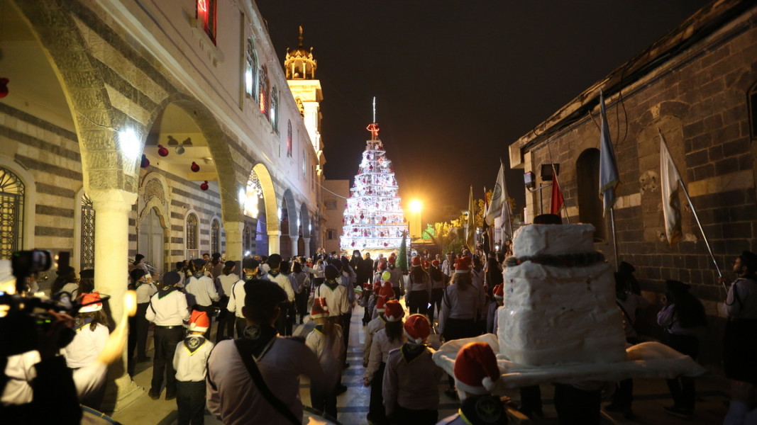 Християните в Сирия посрещат Коледа. Дамаск, 24 декември 2020 г. Снимка: ЕПА/БГНЕС