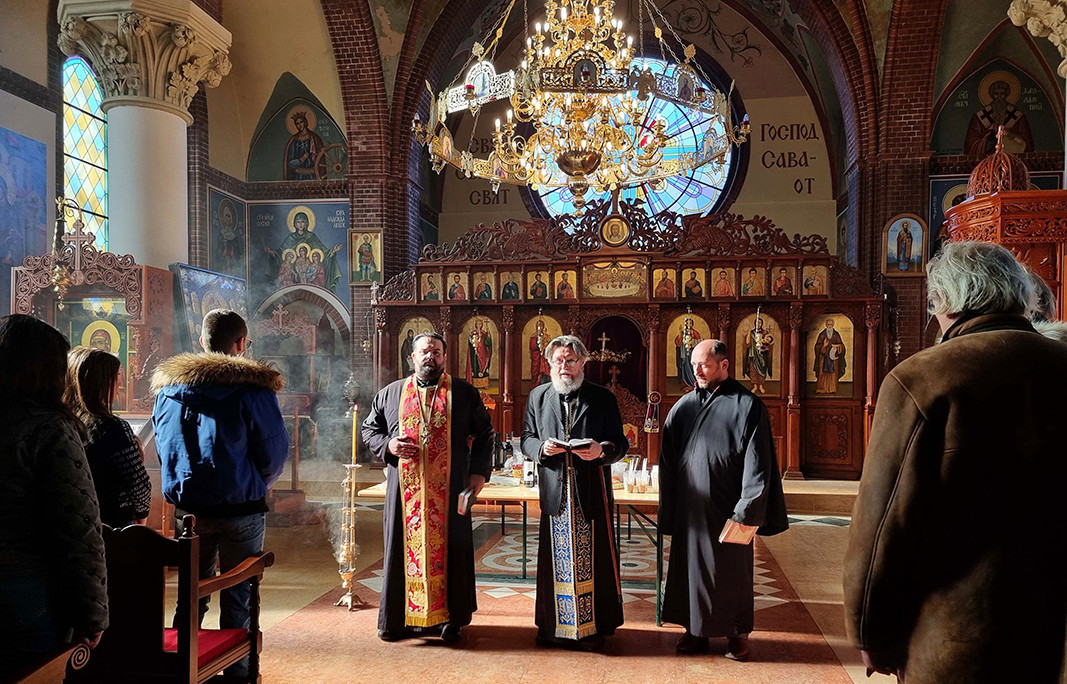 Priest Lyubomir Leontinov (in the middle) during service