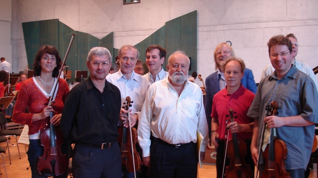 По окончании репетиции с композитором Кшиштофом Пендерецки и коллегами из оркестра