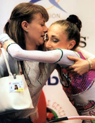Elizabeth with her coach Stela Salapatyiska