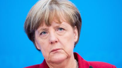 Ангела Меркел в очакване на пресконференцията след изборите