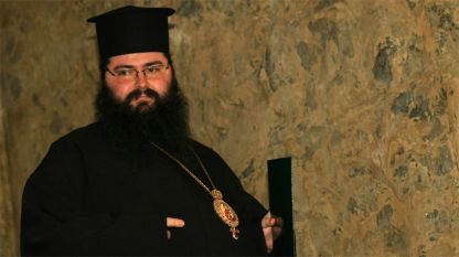 Secretary of Holy Synod announcing the decision