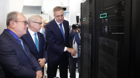 Julian Revalski (L) and Nikolay Denkov (C) present the Hemus supercomputer
