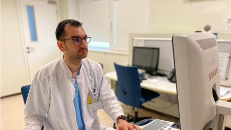 Д-р Адриан Попов 