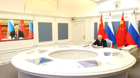 Владимир Путин и Си Цзинпин по време на видеоконферентния разговор