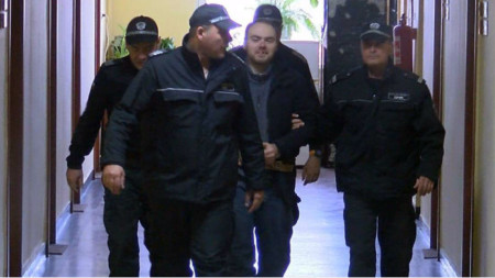 David Bodil (in the middle) is wanted by Interpol in connection with an investigation into the preparation of terrorist acts.