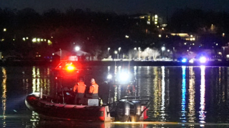 A boat processes the scene of the incident near Ronald Reagan National Airport, January 30, 2025