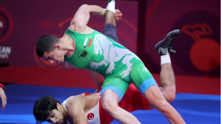 Рухан Расим (в зелено трико) спечели бронзов медал.