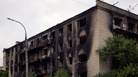 Сграда, пострадала от военните действия в Изюм