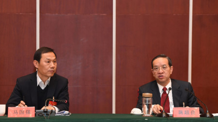 Ръководителите на  комунистическата партия в Ухан  Ма Гоукиянг (вляво) в Хубей Цзян Чаолян