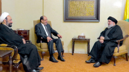 Мохамед Каутарани (вляво) с тогавашния премиер на Ирак Нури ал Малики и с лидера на 