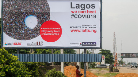 Билборд в Лагос с посланието 