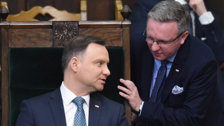Полският президент Анджей Дуда и съветникът му Кшищоф Шчерски.