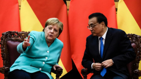 Ангела Меркел и Ли Къцян