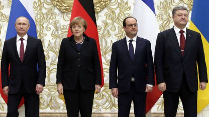 Владимир Путин, Ангела Меркел, Франсоа Оланд и Петро Порошенко на мирните преговори в Минск