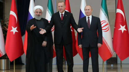 Президентите на Иран Хасан Рохани (вляво), на Турция - Реджеп Ердоган (в средата) и на Русия Владимир Путин на срещата им в Анкара през април.