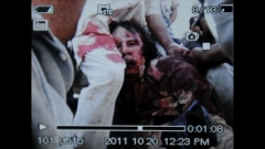 Снимката, разпространена по телевизионни канали, която показва окървавено тяло, за което се твърди, че е на Кадафи.